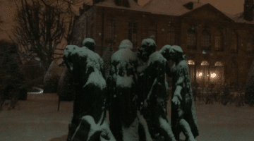 Snow covered sculpture in Paris at night