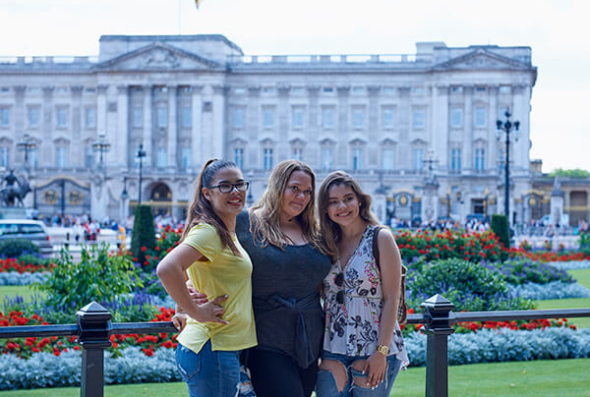 Three young women on tour in London