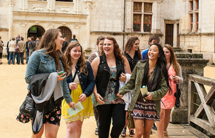 Girls walking through château d'azay-le-rideau in France