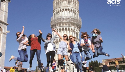 Students jumping in front of the tower of pisa