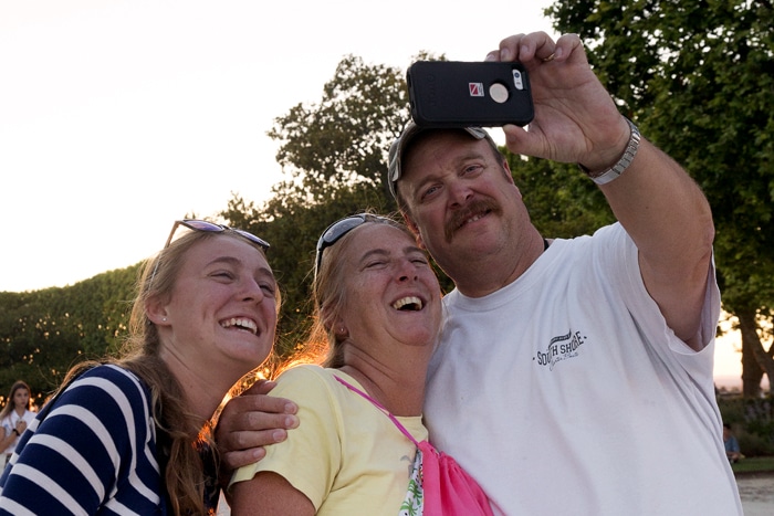 Participant and her parents pose for a selfie