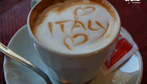 Latte mug with word Italy in froth