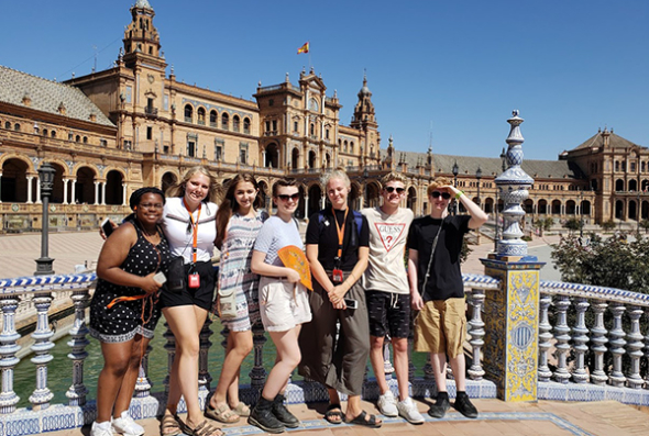 Group of students pose in Plaza de España