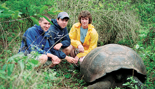 ACIS students with a Galapagos tortoise