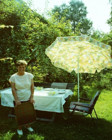 Hildegard standing next to her outdoor table in Germany 1994