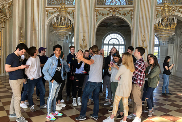 Students tour the inside of Nymphenburg Palace