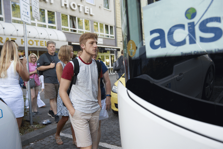 students boarding a private bus in Bavaria