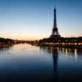 Eiffel tower and river at dawn