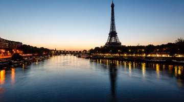 Eiffel tower and river at dawn