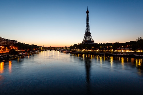 Eiffel tower and river at dawn