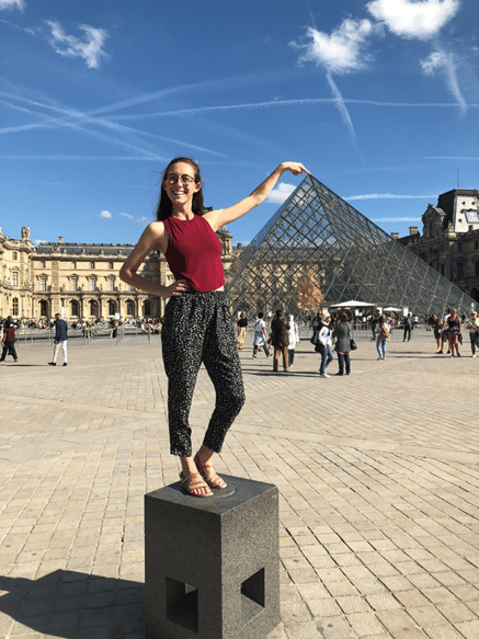 Beth in front of the Louvre