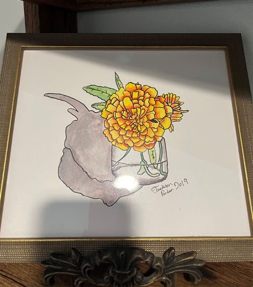 Artwork of yellow flowers in a glass jar