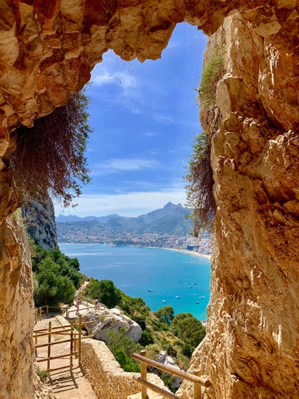 Looking out a cave opening in Spain