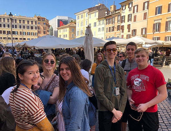 Students at a market in Rome