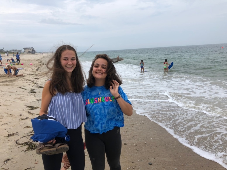 Lily and exchange student friend at the beach