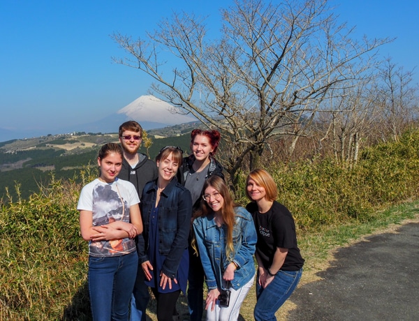 A group with Mt. Fuji in the background in Nagoya, Japan