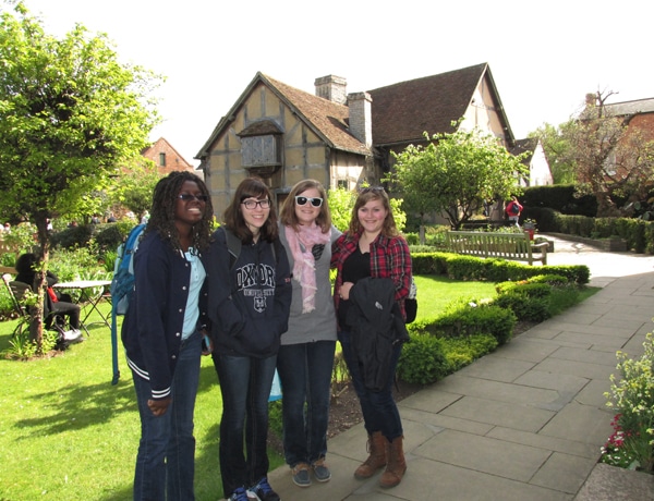 Students standing in front of Shakespeare's birthplace in Stratford-upon-Avon