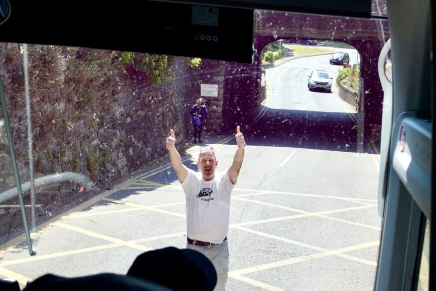 ACIS group leader guides the bus through a tight spot in England