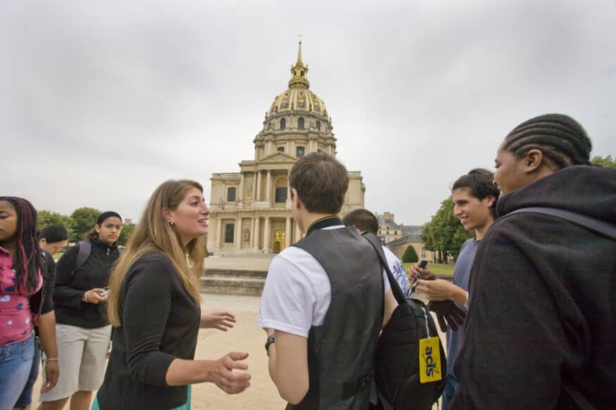 Students with an acis group leader at Les Invalides in Paris