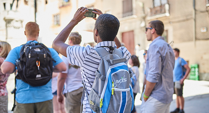 Students taking photos in Segovia