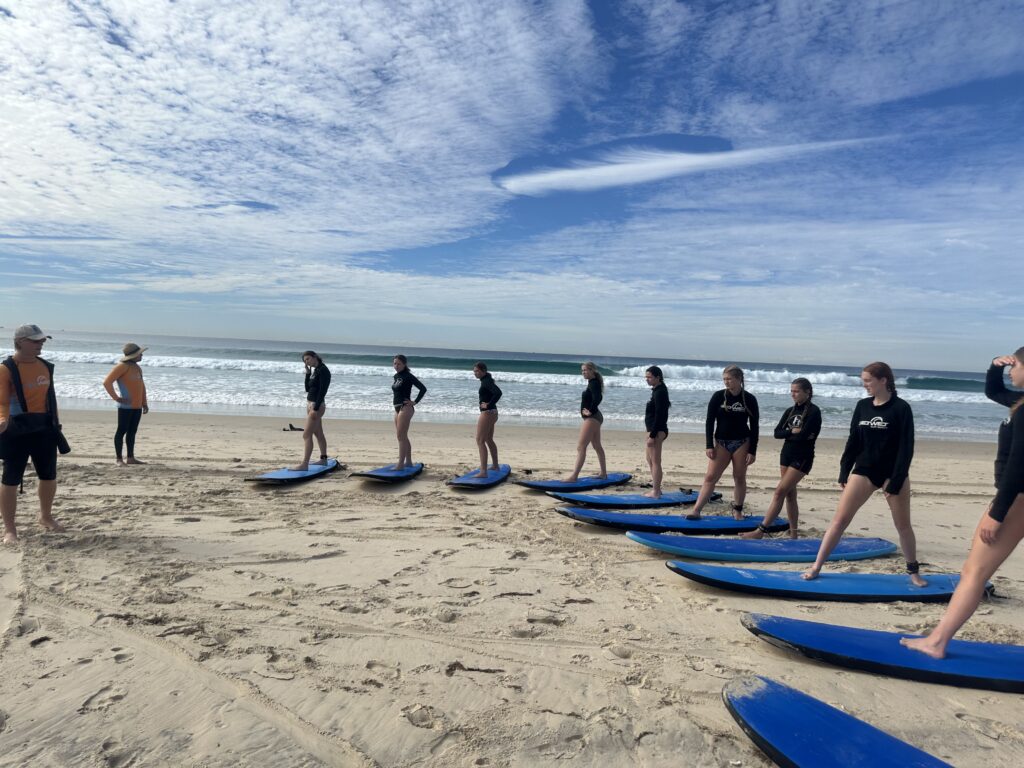 ACIS students at a surfing lesson
