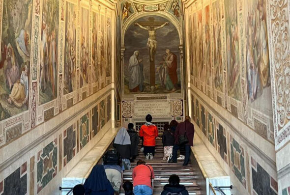Group praying at Scala Santa, Holy Stairs