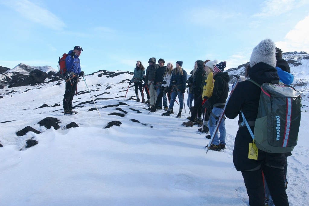Glacier walk on ACIS' Discoveirng STEM in Iceland trip | Description: Students and instructor on snowy mountain