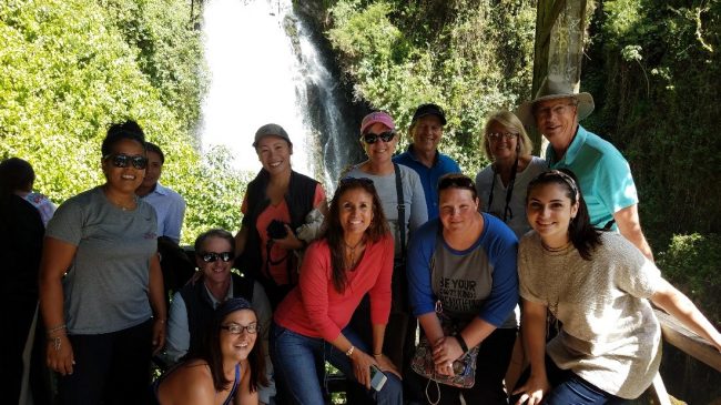 group at waterfall